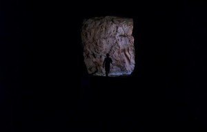 Grandson Running Through a Dark Cave